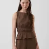 Bawełniany top z gazy z marszczoną talią i peplum