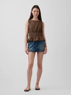 Bawełniany top z gazy z marszczoną talią i peplum