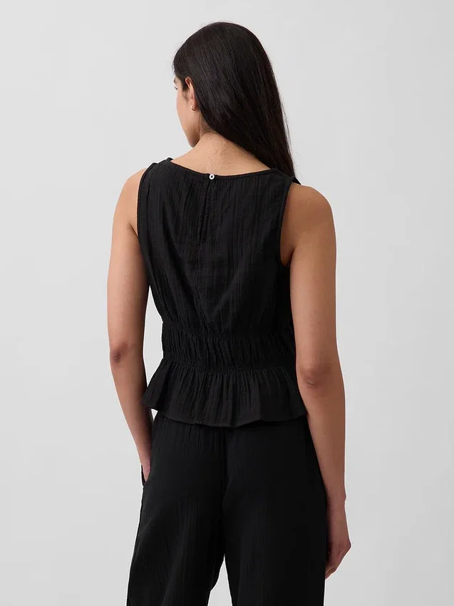 Bawełniany top z gazy z marszczoną talią i peplum