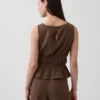 Bawełniany top z gazy z marszczoną talią i peplum