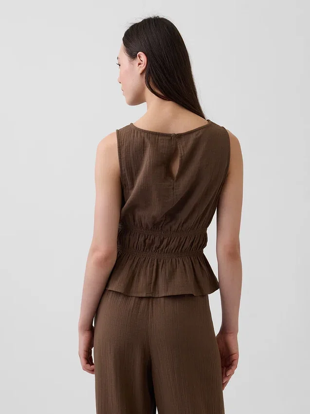 Bawełniany top z gazy z marszczoną talią i peplum