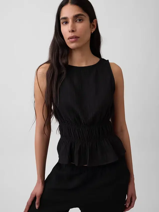 Bawełniany top z gazy z marszczoną talią i peplum