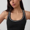 Biustonosz sportowy GapFit Smooth z plecami typu racerback, przeznaczony do ćwiczeń o średniej intensywności