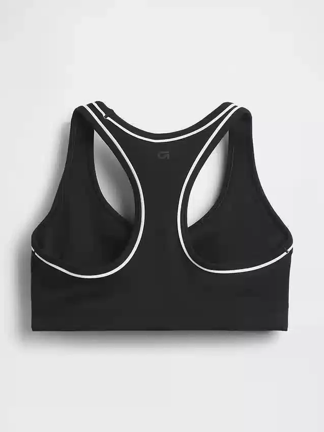 Biustonosz sportowy GapFit Smooth z plecami typu racerback, przeznaczony do ćwiczeń o średniej intensywności