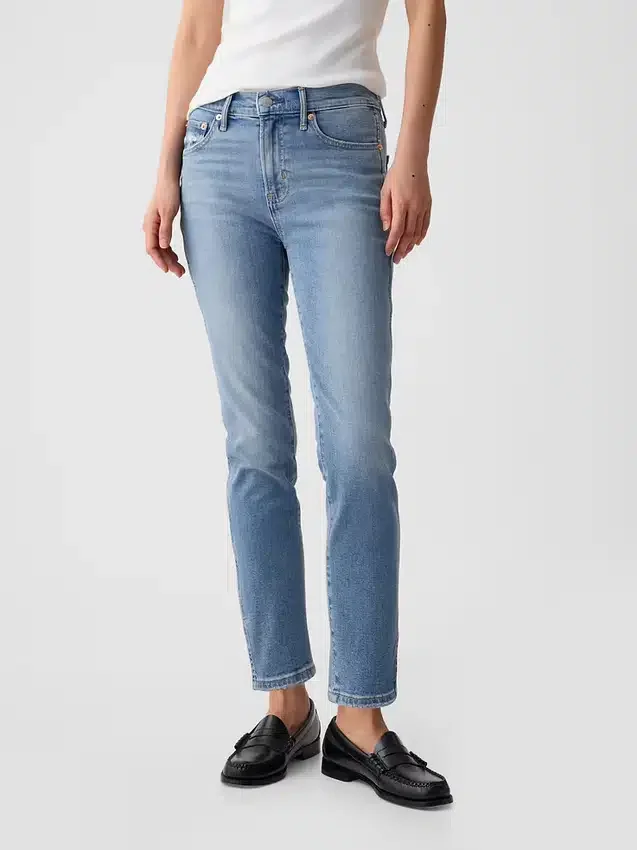 Dżinsy vintage slim o średnim stanie z rozcięciem na dole nogawek