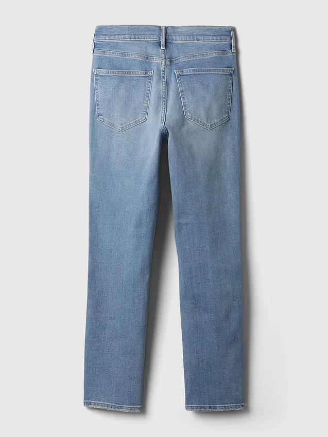 Dżinsy vintage slim o średnim stanie z rozcięciem na dole nogawek