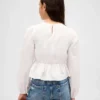 Dziecięca bluzka z marszczonym peplum