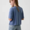 Dziecięca koszulka oversize o prostym kroju z nadrukiem
