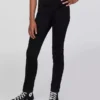 Dziecięce jeansy skinny o średniej wysokości talii