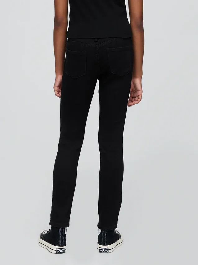 Dziecięce jeansy skinny o średniej wysokości talii