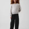 Dziecięce jeansy typu baggy z zwężanymi nogawkami