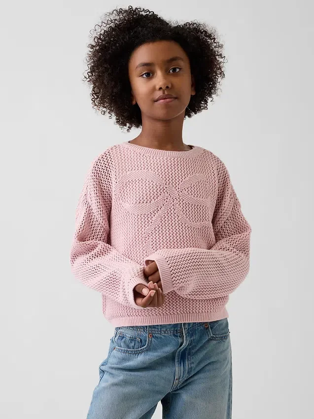 Dziecięcy sweter oversize z nadrukiem, wykonany techniką szydełkową