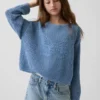 Dziecięcy sweter oversize z nadrukiem, wykonany techniką szydełkową