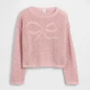 Dziecięcy sweter oversize z nadrukiem, wykonany techniką szydełkową