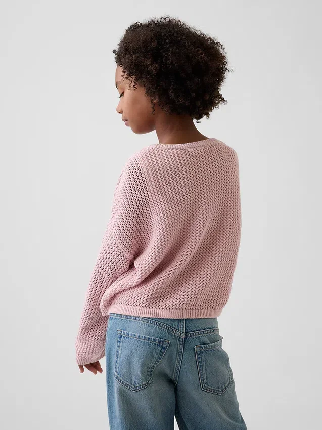 Dziecięcy sweter oversize z nadrukiem, wykonany techniką szydełkową