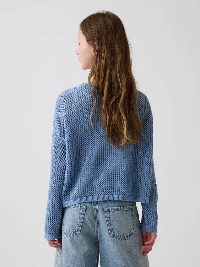 Dziecięcy sweter oversize z nadrukiem, wykonany techniką szydełkową
