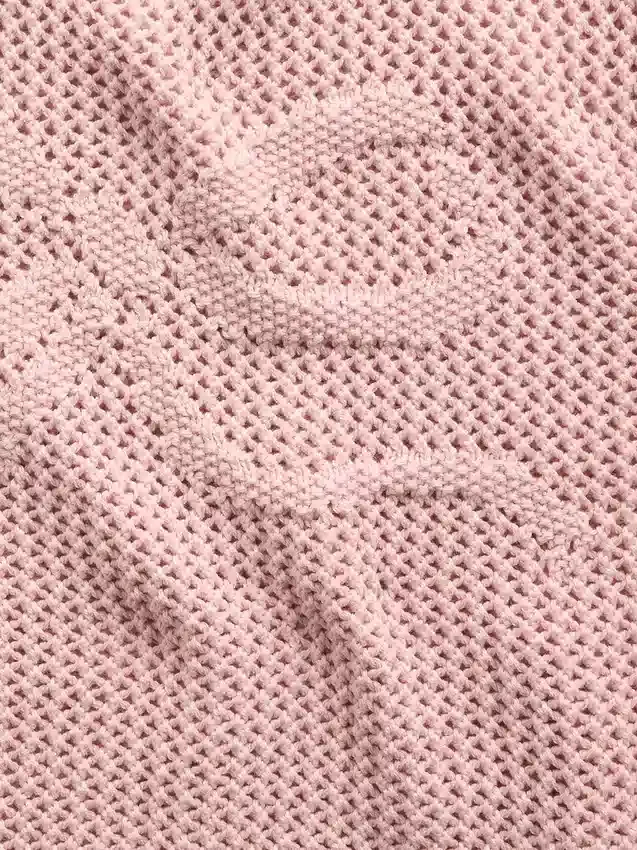 Dziecięcy sweter oversize z nadrukiem, wykonany techniką szydełkową