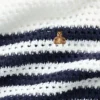 Dziecięcy sweter oversize z paskami, wykonany na szydełku