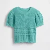 Dziecięcy sweter z falistym wykończeniem i mieszanym ściegiem