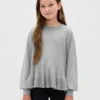 Dziecięcy sweter z luźnym peplum