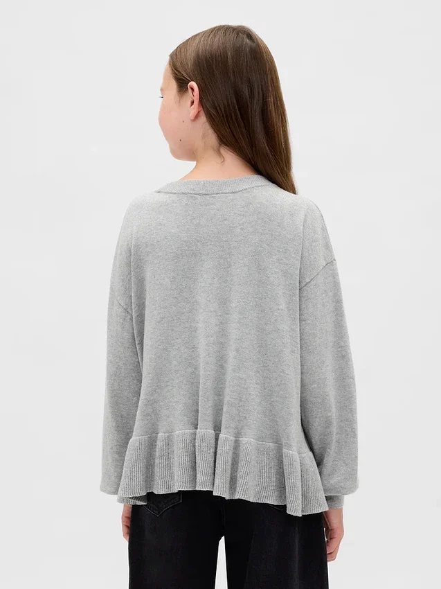 Dziecięcy sweter z luźnym peplum