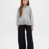 Dziecięcy sweter z luźnym peplum