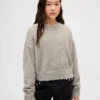Dziecięcy sweter z okrągłym dekoltem z metalicznego dzianiny typu „eyelash”