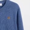 Dziecięcy sweter z zapięciem na guziki w stylu relaxed