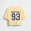 Dziecięcy T-shirt oversize o prostym kroju z logo stanu