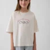 Dziecięcy T-shirt oversize o prostym kroju z motywem Sanrio
