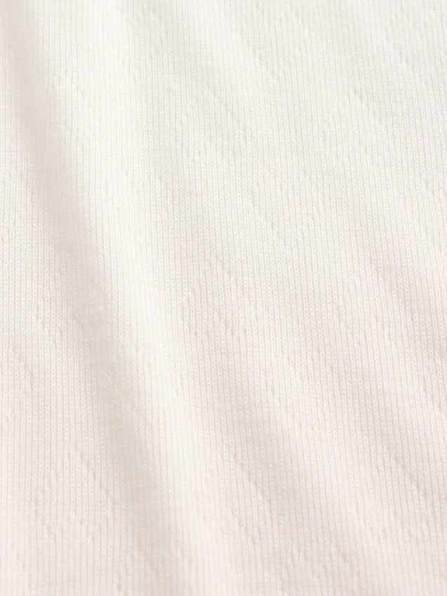 Dziecięcy T-shirt piżamowy z dzianiny typu pointelle z recyklingu