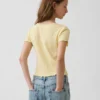 Dziecięcy T-shirt z dzianiny pointelle z prążkowanym wykończeniem i zapięciem na guziki z przodu