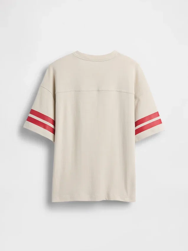 Dziecięcy T-shirt z grubej bawełny dżersejowej w oversize'owym kroju z logo na szwie