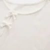 Dziecięcy T-shirt z prążkowanym wykończeniem i kokardką