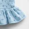 Dziecięcy top z gazy bawełnianej z marszczonym peplum