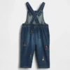 GAP × Disney Baby – dżinsowe kombinezony
