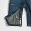 GAP × Disney Baby – dżinsowe kombinezony