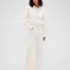 Jeansy GAP × Victoria Beckham z wysokim stanem i zaokrąglonymi nogawkami