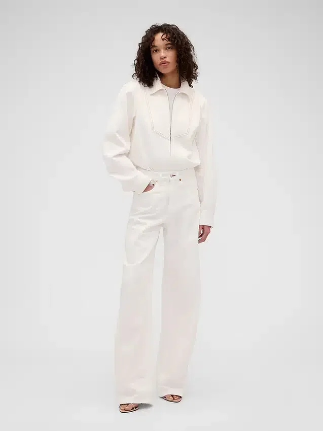 Jeansy GAP × Victoria Beckham z wysokim stanem i zaokrąglonymi nogawkami