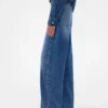Jeansy GAP × Victoria Beckham z wysokim stanem i zaokrąglonymi nogawkami