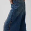 Jeansy z niskim stanem, ultramiękkie, z ćwiekami i luźnym krojem