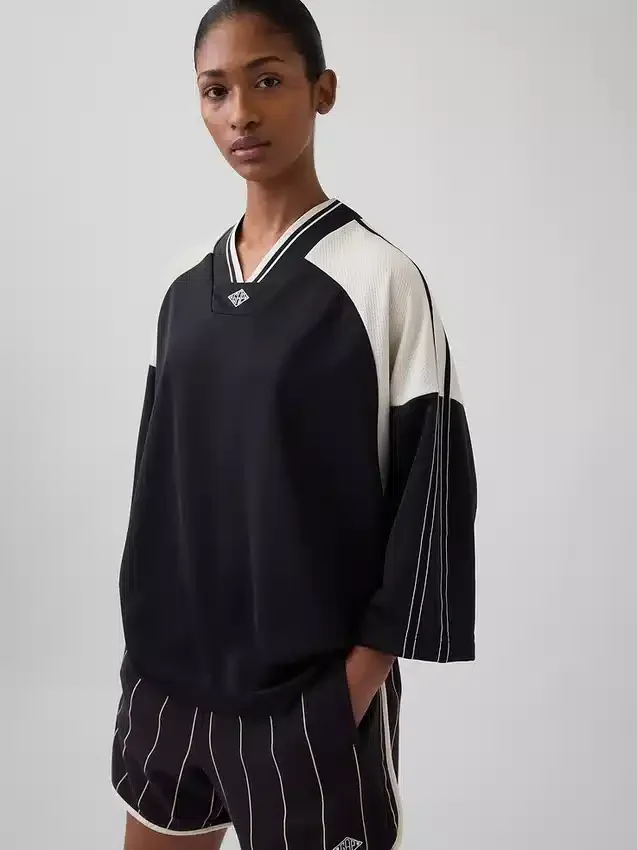 Koszulka dżersejowa z oversize'owym logo Ouigap