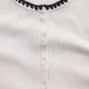 Nowoczesny T-shirt z okrągłym dekoltem i guzikami z dzianiny prążkowanej