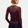 Przezroczysty sweter z wysokim kołnierzem