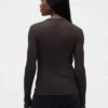 Przezroczysty sweter z wysokim kołnierzem