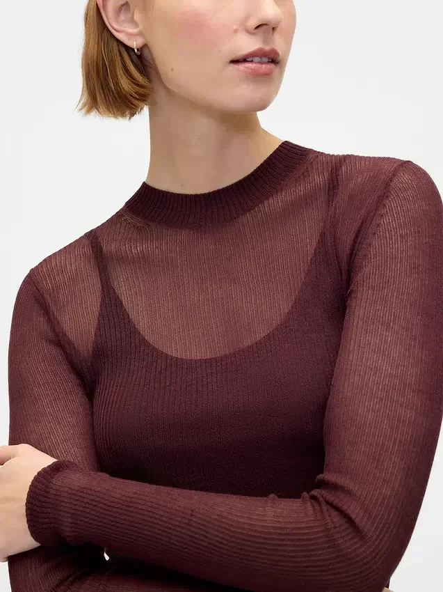 Przezroczysty sweter z wysokim kołnierzem