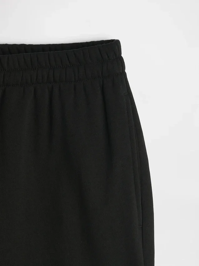 Spodnie dresowe o średniej wysokości w pasie, luźne, z materiału Vintagesoft