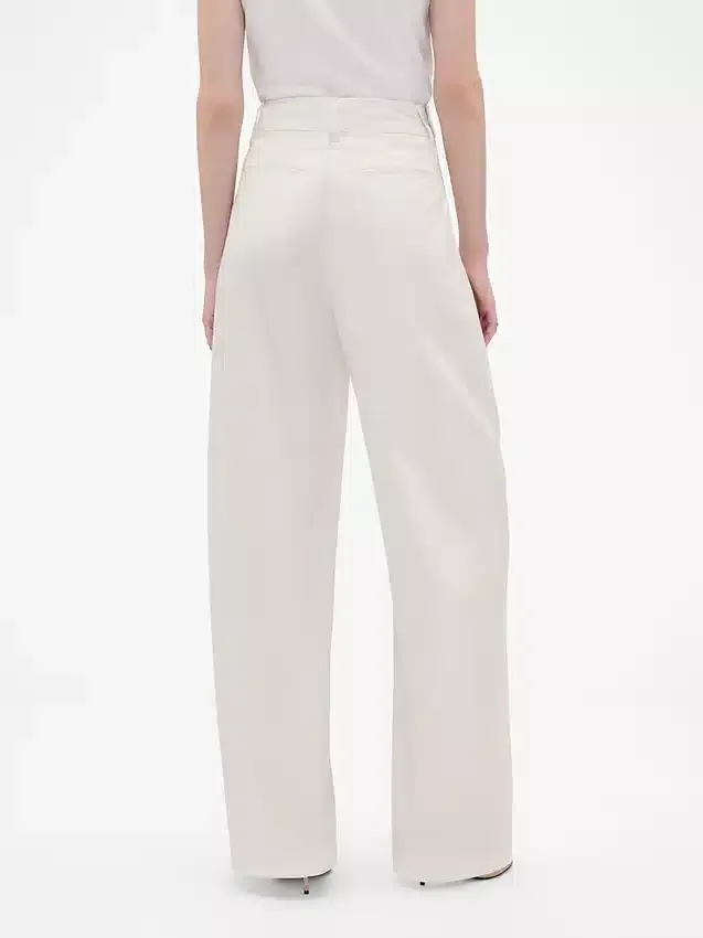 Spodnie GAP × Victoria Beckham z wysokim stanem i plisami w kształcie łuku