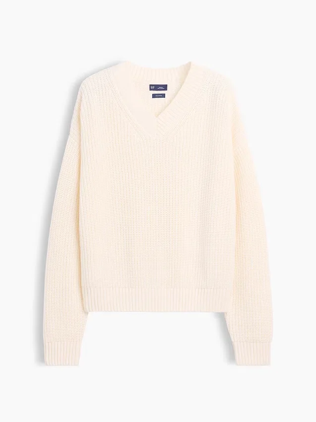 Swetr oversize z dekoltem w serek, wykonany w 100% z bawełny