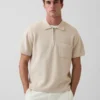 Swetr polo oversize z kieszenią i zamkiem do połowy